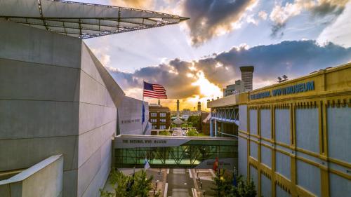 a view of a building with the sunset in the background at Crowne Plaza New Orleans French Qtr - Astor by IHG in New Orleans