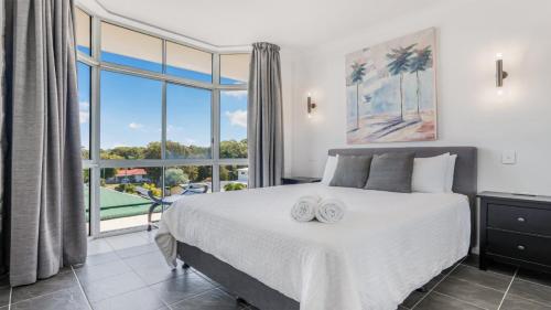 Ένα ή περισσότερα κρεβάτια σε δωμάτιο στο Two Storey Gem In Heart Of Woorim