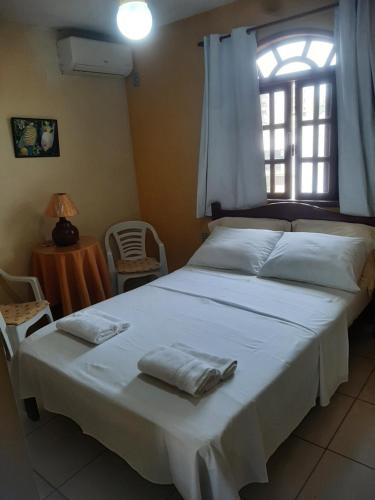 Ένα ή περισσότερα κρεβάτια σε δωμάτιο στο Quarto Praia das Dunas Braga