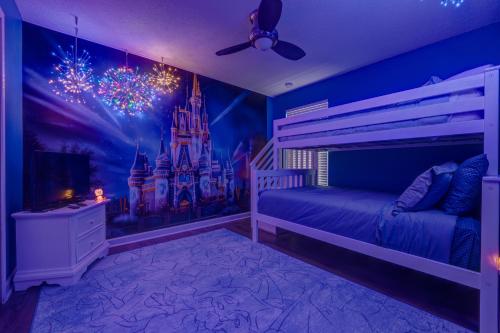 a bedroom with a disney castle mural on the wall at NEW, Disney,10mi, Themed Rooms, PvtPool, Movie, Game Room in Kissimmee