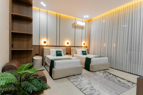 Кровать или кровати в номере Divan Hills