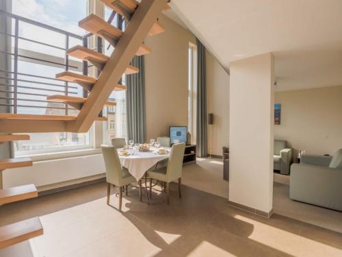 Posezení v ubytování Modern family apartment near Anvers Central