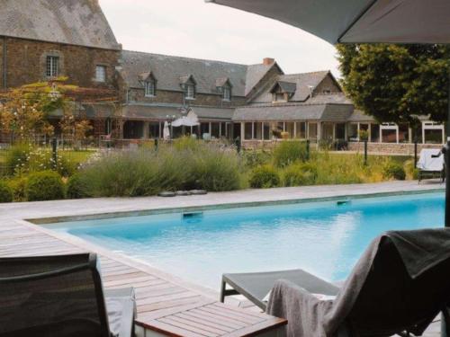 Πισίνα στο ή κοντά στο Hotel de L'Abbaye Le Tronchet - Handwritten Collection