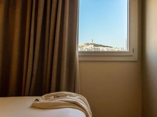 Katil atau katil-katil dalam bilik di ibis Styles Marseille Palais des Congrès Vélodrome