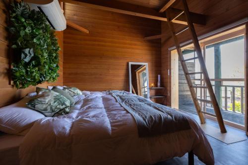 Postel nebo postele na pokoji v ubytování LIT shimanami リットシマナミ