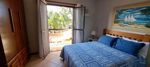 Llit o llits en una habitació de Peró com piscina e conforto!