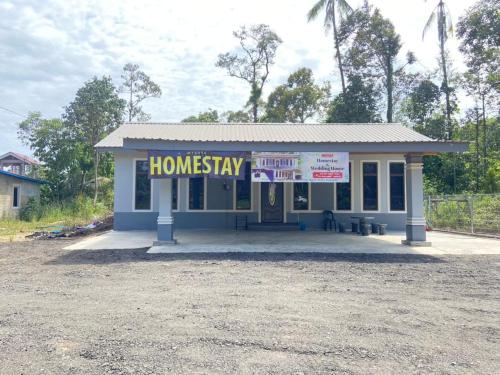 a house with a sign that reads homesteadery at Mysara Homestay Batu Gajah Tanah Merah in Tanah Merah