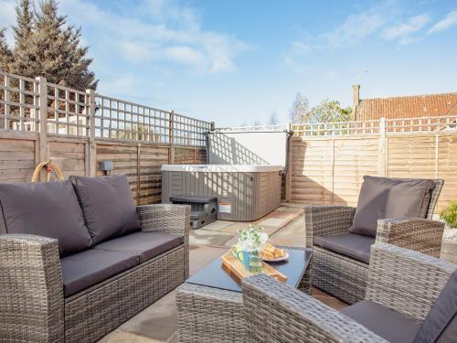 Et opholdsområde på Poppy Cottage - Uk31296