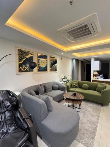 Posezení v ubytování Gold Crest Luxury Hotel Apartments DHA Phase 4 Lahore