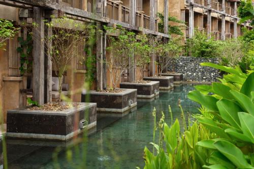 Ein Garten an der Unterkunft Vignette Collection Dinso Resort & Villas Ko Chang by IHG