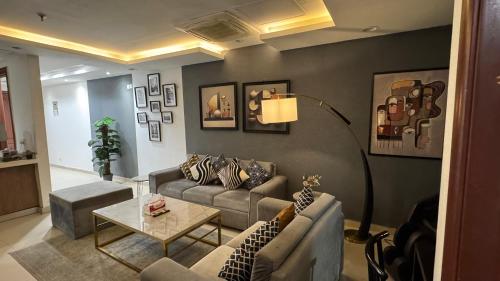 Posezení v ubytování Gold Crest Luxury Hotel Apartments DHA Phase 4 Lahore