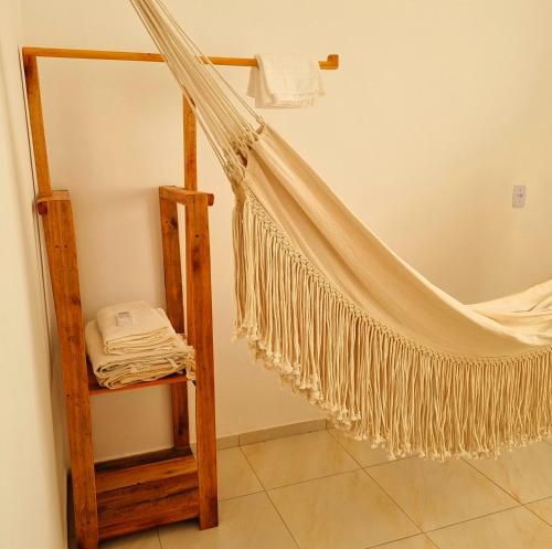 Llit o llits en una habitació de Pousada Aconchego Vitória E
