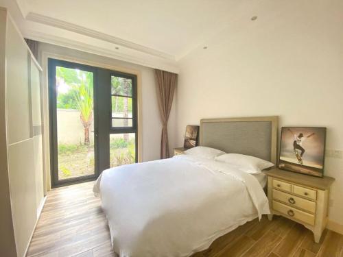 Ένα ή περισσότερα κρεβάτια σε δωμάτιο στο LanyiVilla