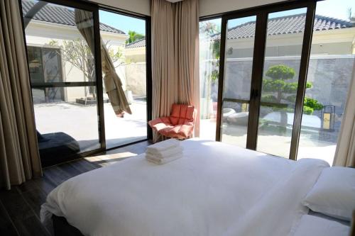 Ένα ή περισσότερα κρεβάτια σε δωμάτιο στο LanyiVilla