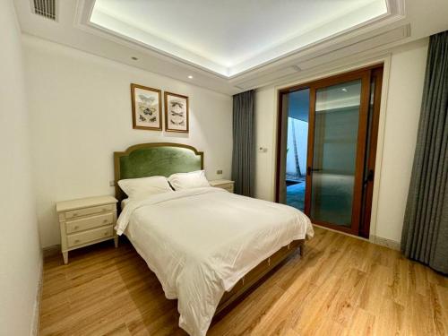 Ένα ή περισσότερα κρεβάτια σε δωμάτιο στο LanyiVilla