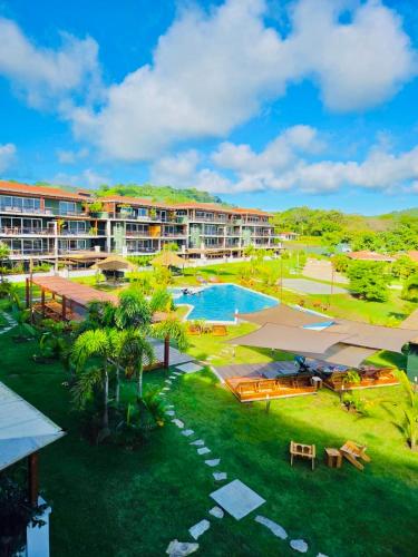 an aerial view of a resort with a swimming pool at LUXURY Apartment in BLUE Playa Venao B-32 in Playa Venao