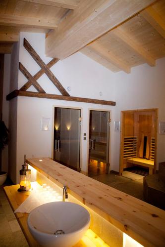 a bathroom with a sink in a room at Alpengasthof Norbertshöhe Superior in Nauders