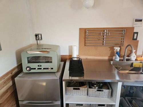 Η κουζίνα ή μικρή κουζίνα στο Tozanso, a Satoyama Inn where you can live in a carefree way