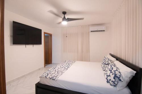 Giường trong phòng chung tại Your Ideal Refuge in Punta Cana