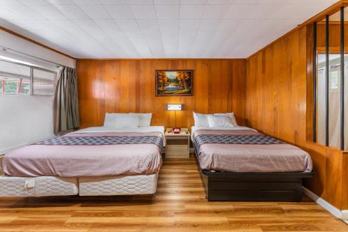 Postel nebo postele na pokoji v ubytování Budget Inn Pulaski