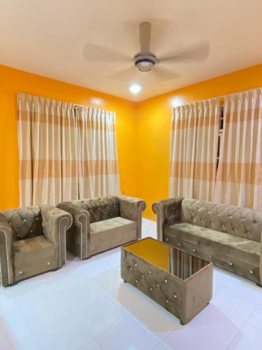 Χώρος καθιστικού στο DeSyafiq Homestay