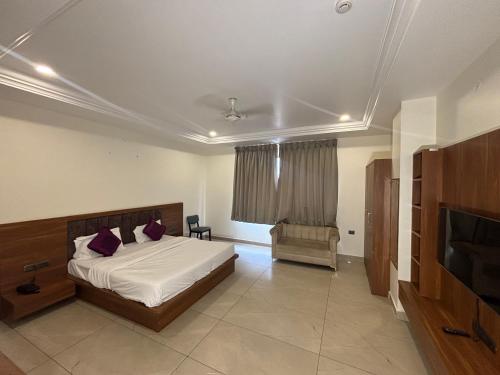 Ένα ή περισσότερα κρεβάτια σε δωμάτιο στο Hotel Park Areca, Jaipur