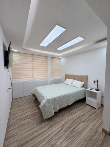Ένα ή περισσότερα κρεβάτια σε δωμάτιο στο Jam's Suite Hogar y Confort