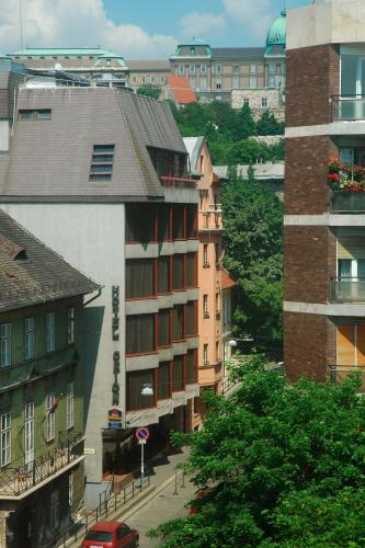 a view of a city with buildings and a street at Hotel Orion in Budapest
