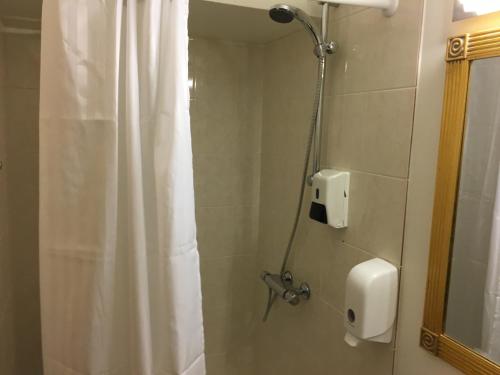 Et badeværelse på Welcome Apartments