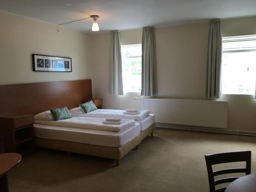 Um quarto em Welcome Apartments