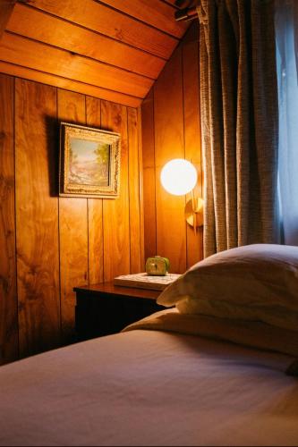 Postel nebo postele na pokoji v ubytování Cabin on Rainbow