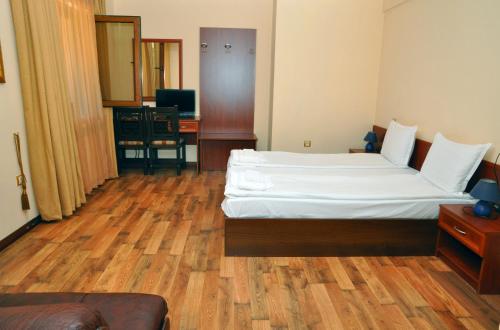 Krevet ili kreveti u jedinici u okviru objekta Family Hotel Fedora