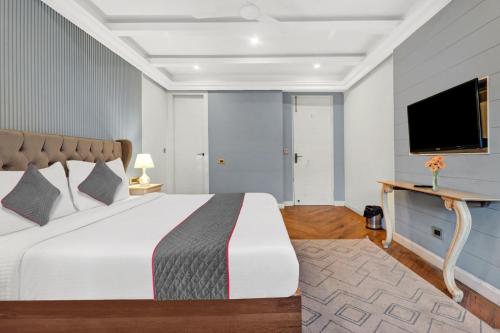 Postel nebo postele na pokoji v ubytování Hotel Lite Near IGI Airport Delhi