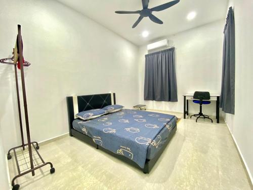 Ένα ή περισσότερα κρεβάτια σε δωμάτιο στο D' Irama Bachok Homestay