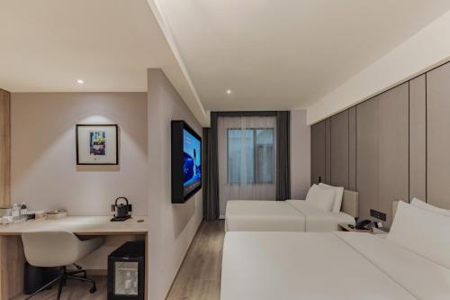 Μια τηλεόραση ή/και κέντρο ψυχαγωγίας στο Atour Hotel Xujiahui Center