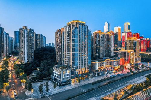 an aerial view of a city with tall buildings at Chongqing From Hotel in Chongqing