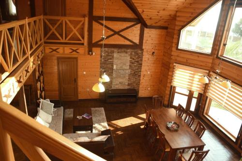 an overhead view of a room with a table and chairs at Villa Coast of Montenegro in Bar