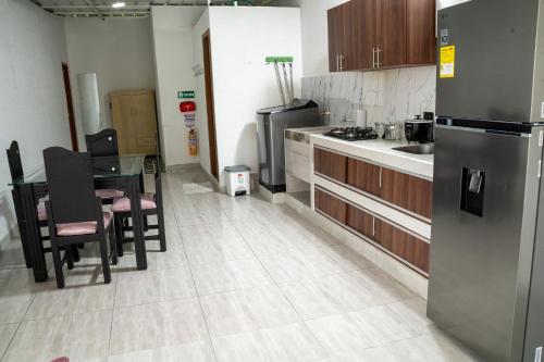 Η κουζίνα ή μικρή κουζίνα στο Casa hotel la Pavona Armenia