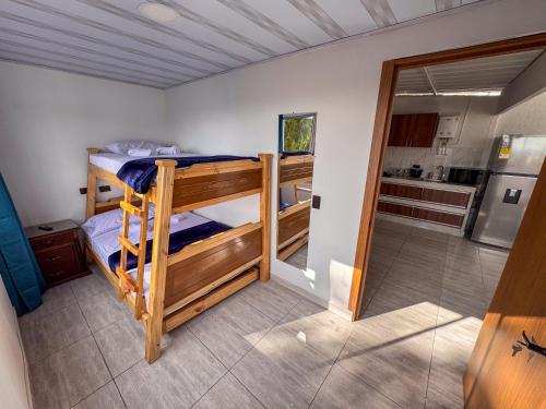 Ένα ή περισσότερα κρεβάτια σε δωμάτιο στο Casa hotel la Pavona Armenia