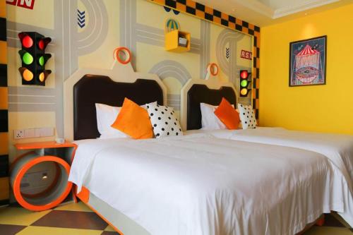 Postel nebo postele na pokoji v ubytování Mangrove Tree Resort World Qingdao