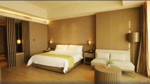 Postel nebo postele na pokoji v ubytování Mangrove Tree Resort World Qingdao