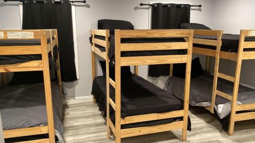 a group of bunk beds in a room at La Cienega Soul in Los Angeles