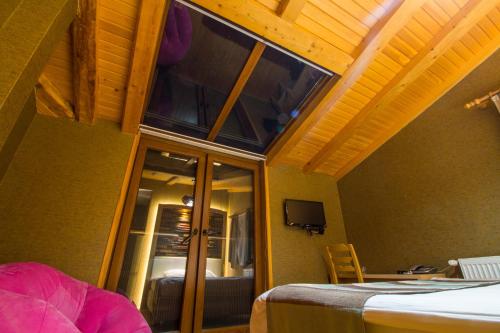 Ayderoom Hotelにあるテレビまたはエンターテインメントセンター