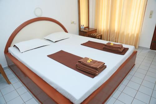 Postel nebo postele na pokoji v ubytování Sunil Lanka Hotel