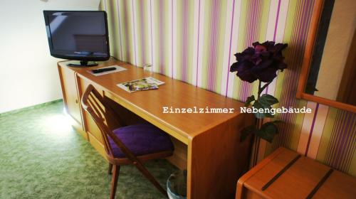 Exempel Schlafstuben und Quartier Langer Halsにあるテレビまたはエンターテインメントセンター