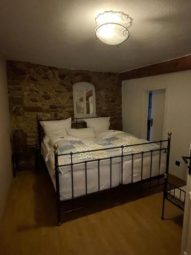 Ένα ή περισσότερα κρεβάτια σε δωμάτιο στο Zum Burggraf