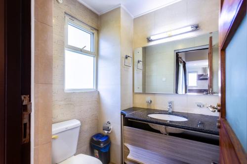 Koupelna v ubytování Suite Homes, Serviced Apartment Hotel