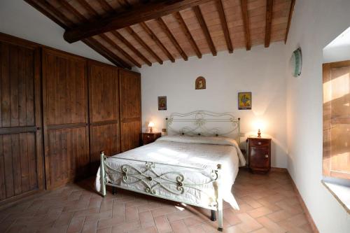 Postel nebo postele na pokoji v ubytování Agriturismo Le Cerinaie