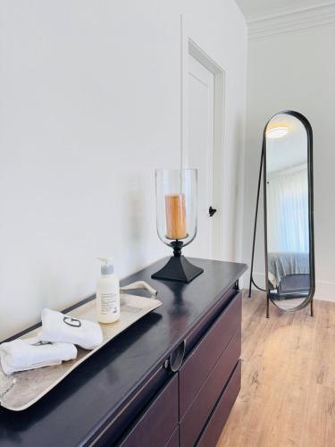 a counter with a blender on top of a dresser at Charming King Bedroom with Private Bathroom Vancouver West in Vancouver