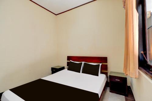 Letto o letti in una camera di Dancenter Jc Boutique Hotel